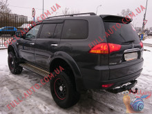 Спойлер Mitsubishi Pajero Sport 08-15 ДСТ (стеклопластик, под покраску)