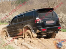 Спойлер Mitsubishi Pajero Sport 96-08 ДСТ (стеклопластик, под покраску)